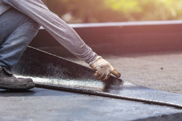 Professional Basement Waterproofing technician working in Perkasie, PA